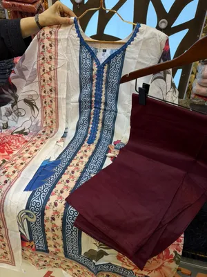 Elegant Swizz Cotton Suit with Panel Embroidery Work