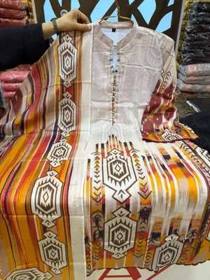 Graceful Swizz Cotton Suit with Neck and Sleeve Panel Work