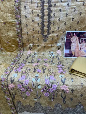 Elegant Swizz Cotton Suit with Boring and Embroidery Work