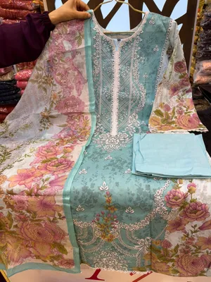 Stylish Swizz Cotton Suit with Panel Embroidery Work