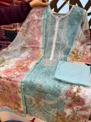 Stylish Swizz Cotton Suit with Panel Embroidery Work