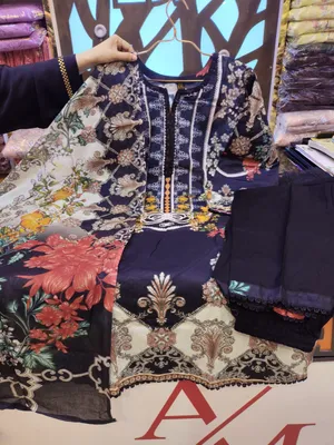 Designer Swizz Cotton Palazzo Suit with Neck Panel Work