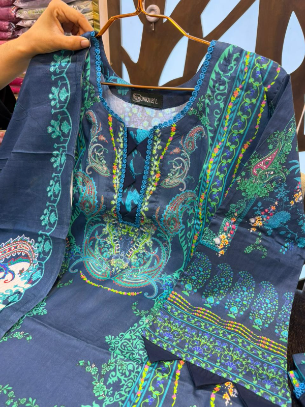 Elegant Swizz Cotton Suit with Decorative Lace Panel Work