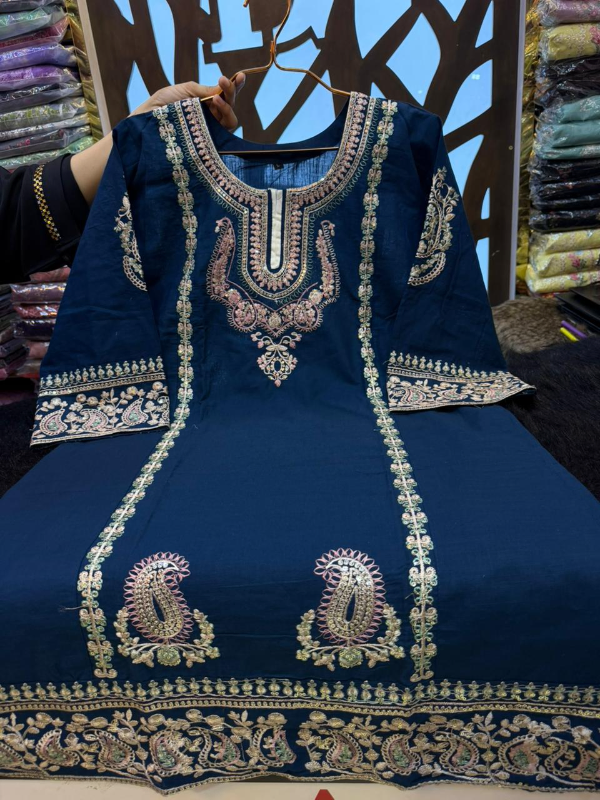 Designer Swizz Cotton Suit with Panel Lace Accents