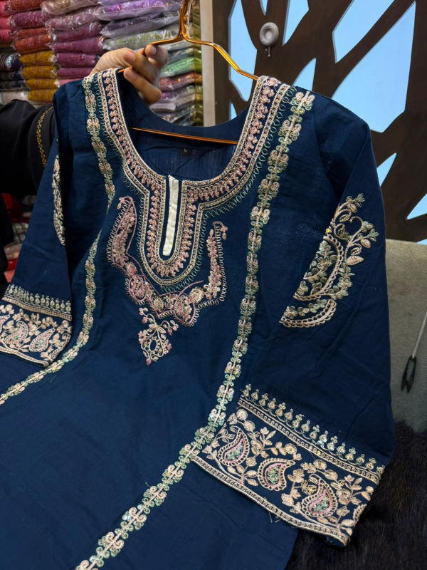 Designer Swizz Cotton Suit with Panel Lace Accents