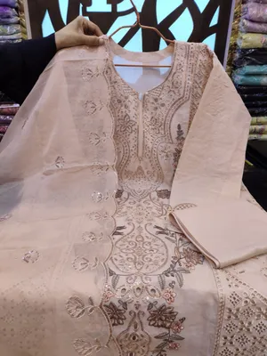 Refined Swizz Lawn Suit with Intricate Boring Design