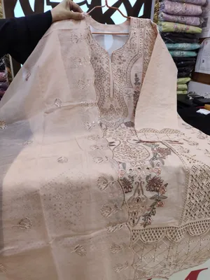 Refined Swizz Lawn Suit with Intricate Boring Design