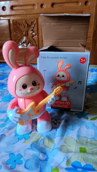 dancing giturist rabbit toy 