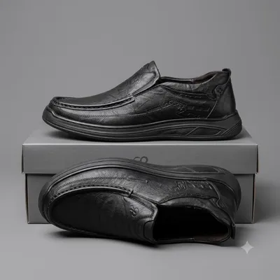 Black Leather Slip-On—Classic Comfort with Moc-Toe Stitching 