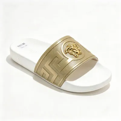 luxury-style embossed slide: Greek-key pattern strap 3D medallion accent, cushioned footbed-black-gold, silver