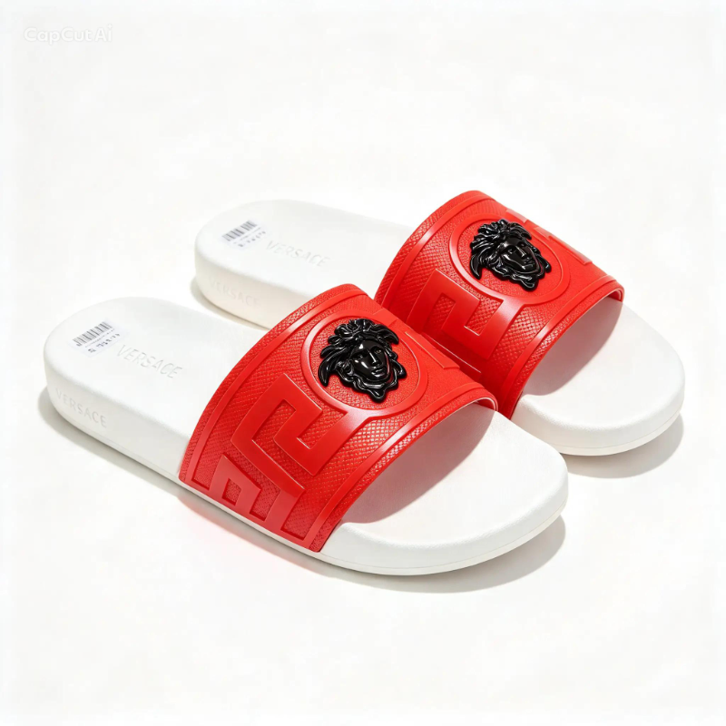 luxury-style embossed slide: Greek-key pattern strap 3D medallion accent, cushioned footbed-black-gold, silver