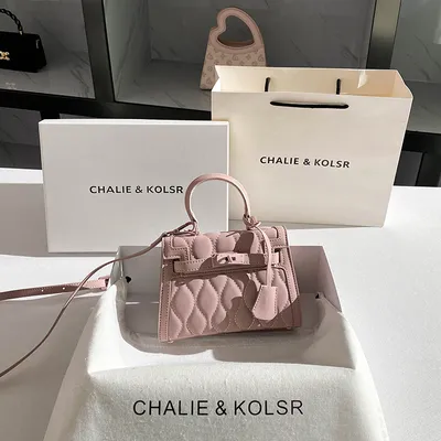 A generation of embossed Kelly bag 