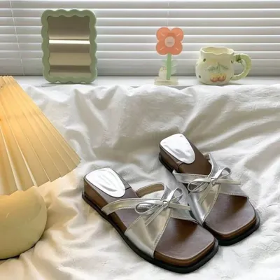 Women Silver Bow Cross Slide Sandal.
