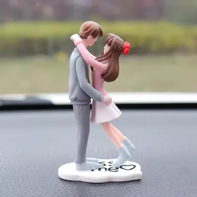 “Romantic Couple Hugging Figurine”