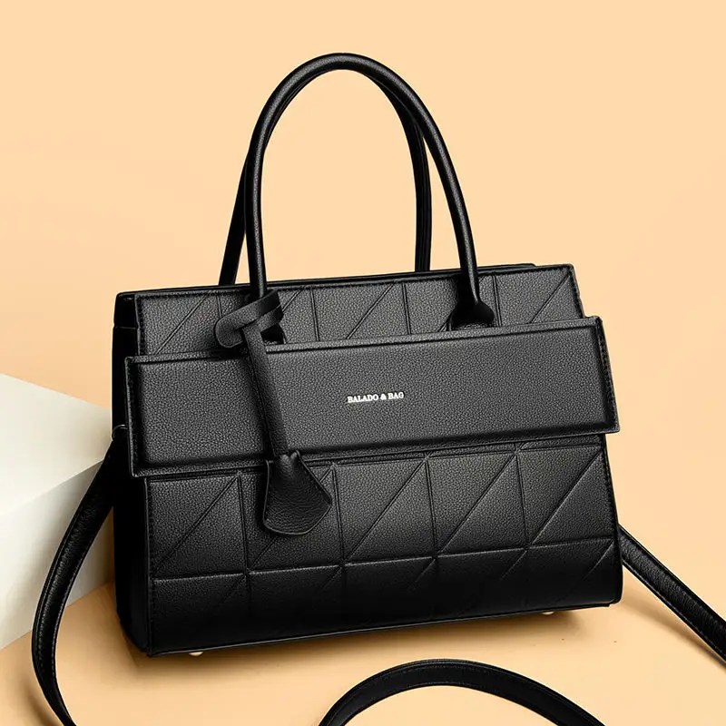 Moodie Luxe Handbag In Stock