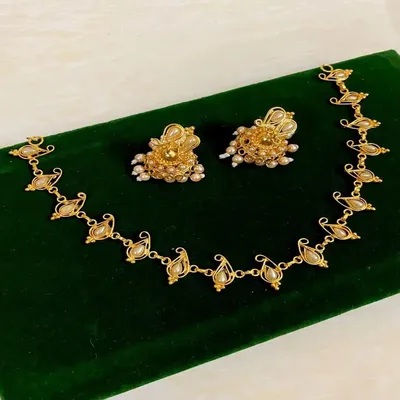 Gold Polished Necklace Set with Pearl Detailing – Traditional & Party Wear Jewellery