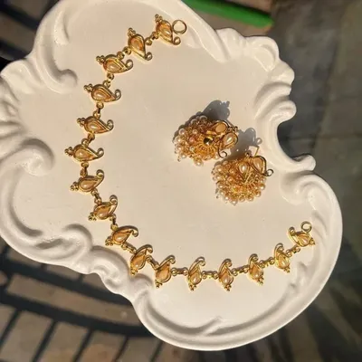 Gold Polished Necklace Set with Pearl Detailing – Traditional & Party Wear Jewellery