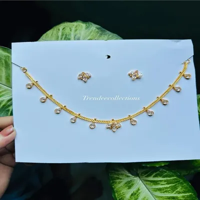 Simple Gold Polished Stone Neckpiece Set – Minimal & Elegant Party Wear Jewellery