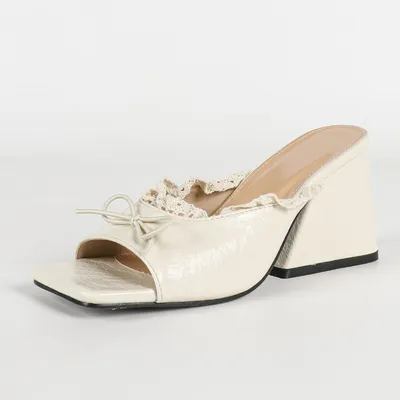 IVORY BOW WEDGES