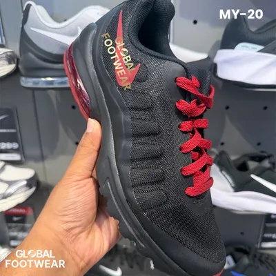 Nike Air Max Invigor sneakers in a black and red