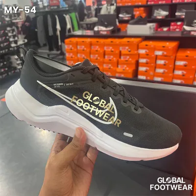 black and white Nike Downshifter 12 running shoes