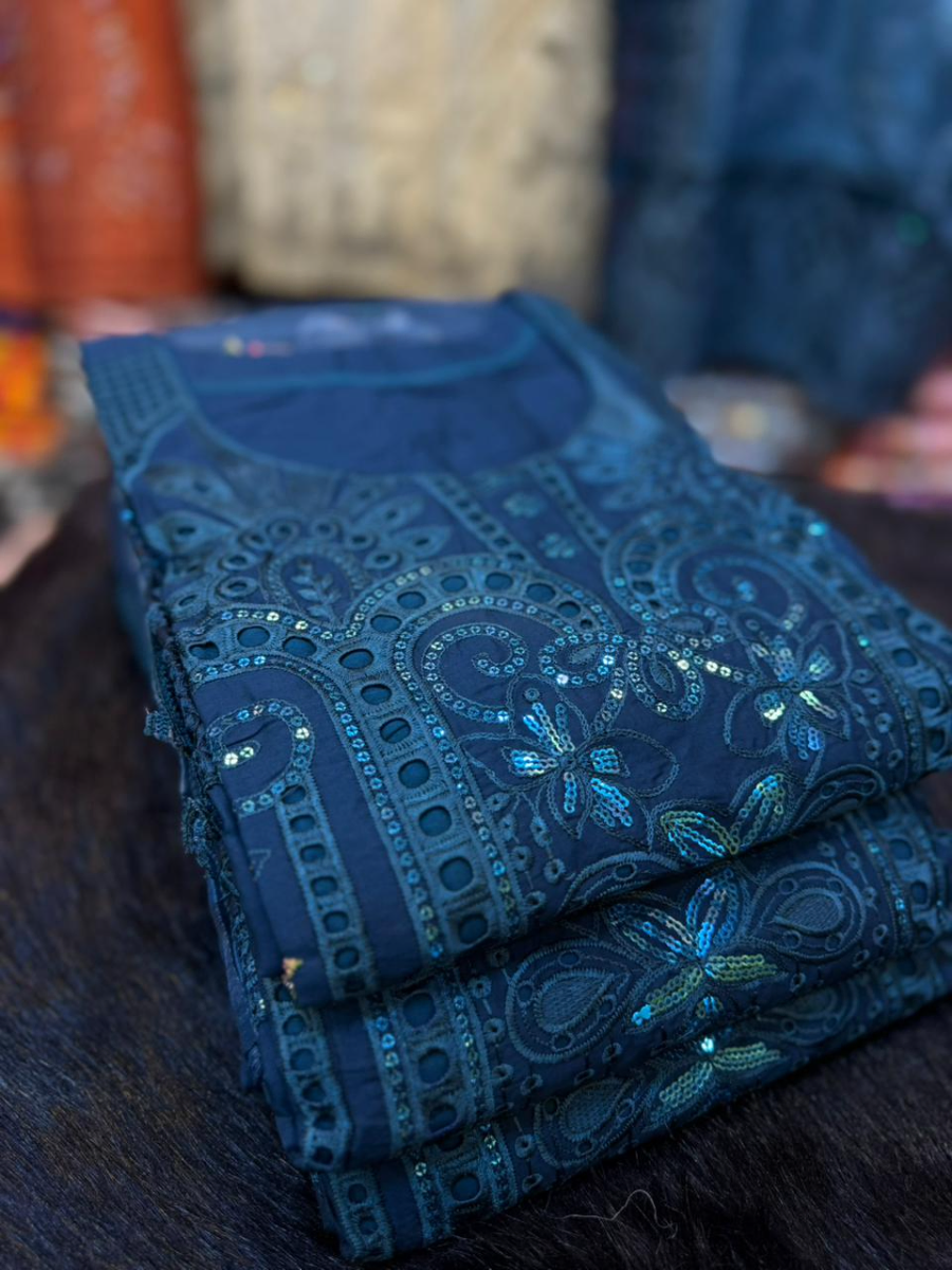 Long-Length Swizz Cotton Ensemble with Decorative Detailing