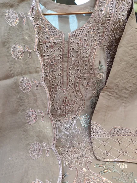 Sophisticated Swizz Lawn Suit with Intricate Boring Work