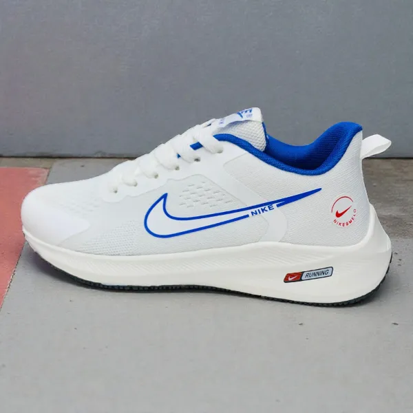 White Nike Running Shoe with Blue Accents